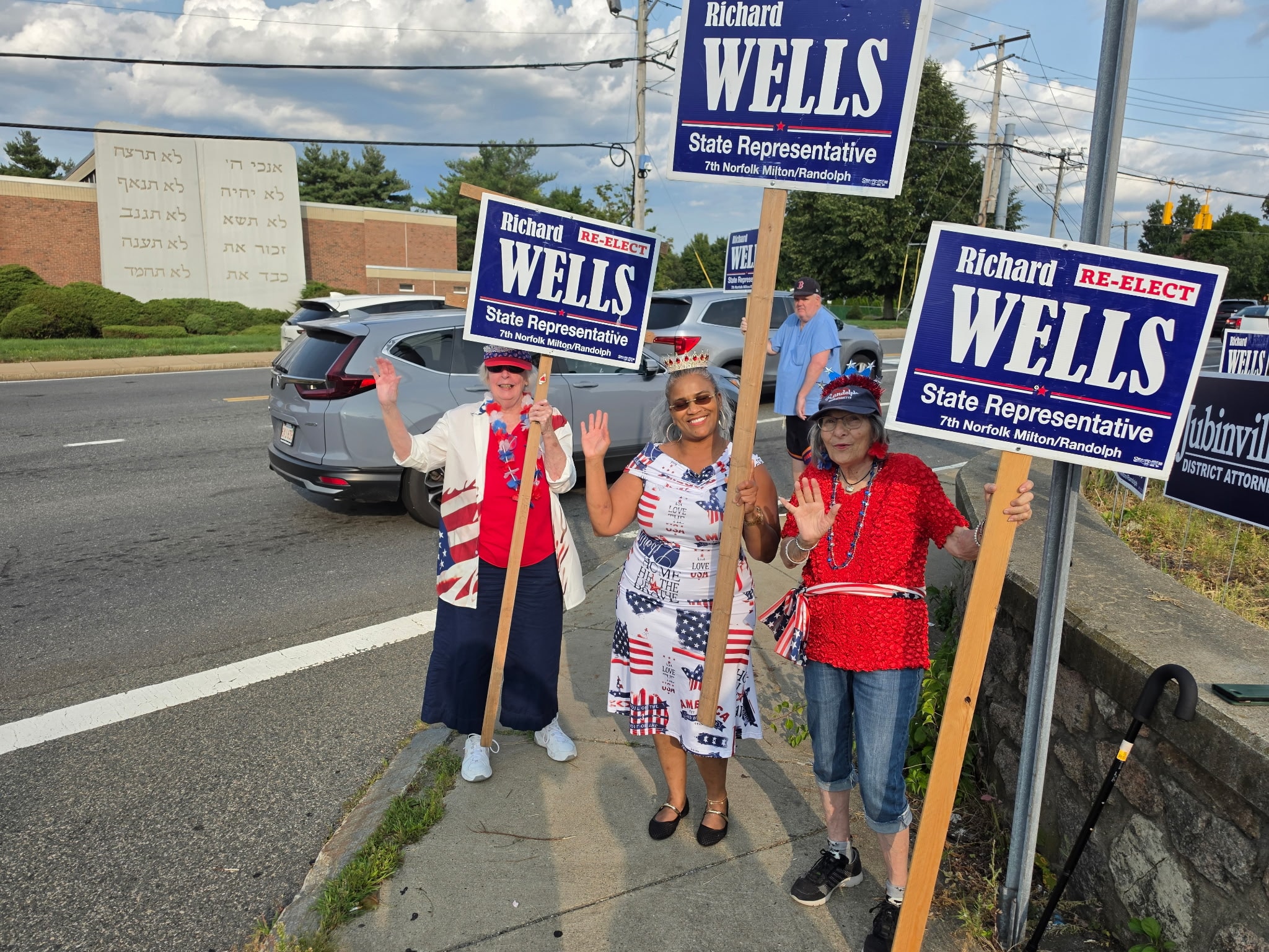 Campaign supporters holding signs