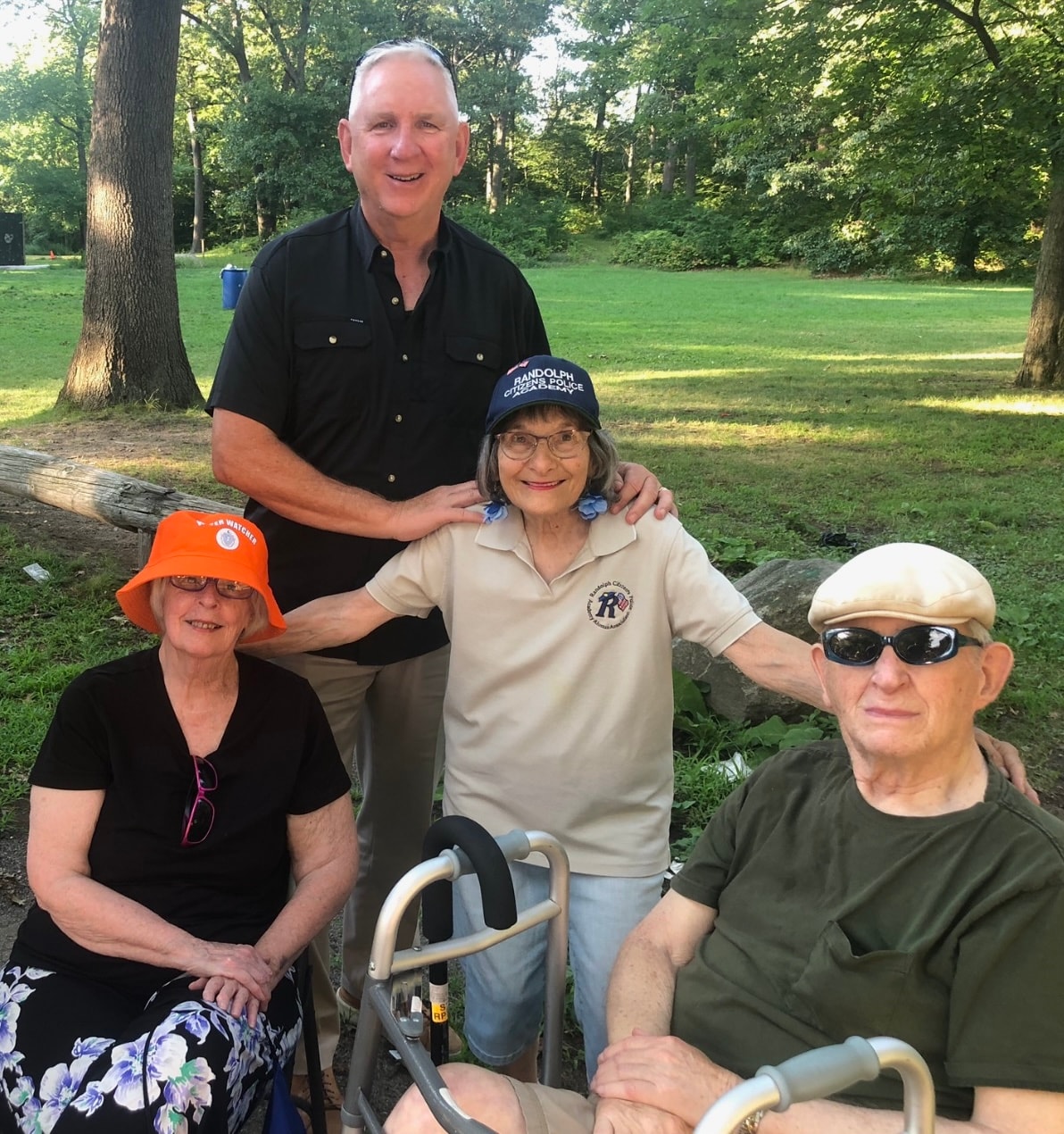 Richard Wells with seniors at a community event